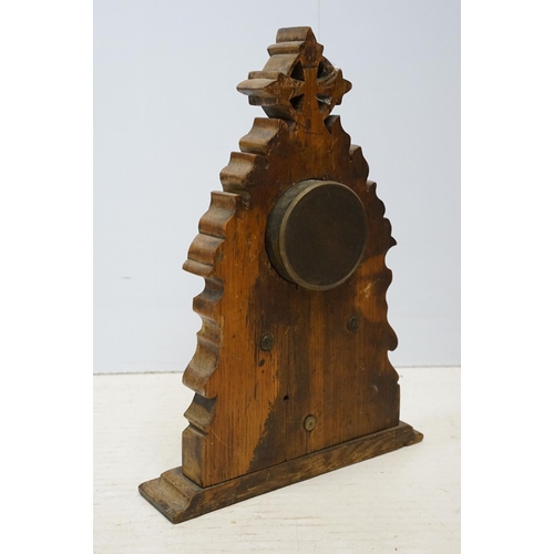 179 - Late 19th / early 20th century wooden ashtray raised on three paw feet, a carved oak mantel clock & ... 