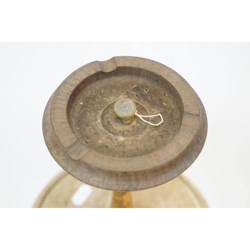 179 - Late 19th / early 20th century wooden ashtray raised on three paw feet, a carved oak mantel clock & ... 