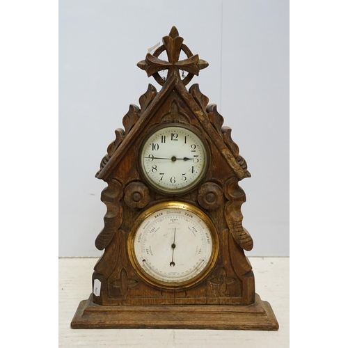 179 - Late 19th / early 20th century wooden ashtray raised on three paw feet, a carved oak mantel clock & ... 