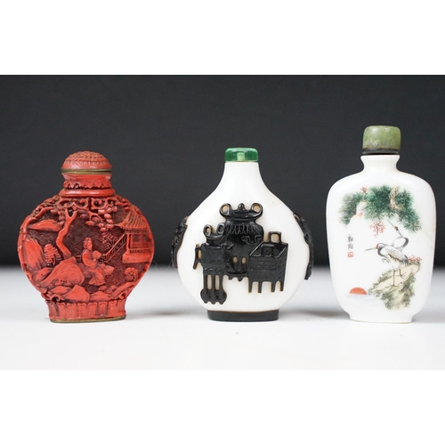356 - A collection of Chinese scent bottles to include glass and cinibar lacquer examples
