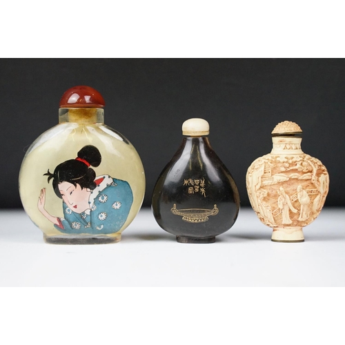 356 - A collection of Chinese scent bottles to include glass and cinibar lacquer examples