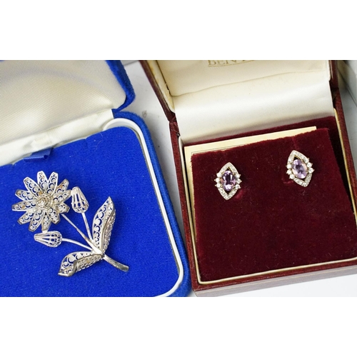 366 - A collection of mixed costume jewellery to include silver examples together with a selection of wris... 