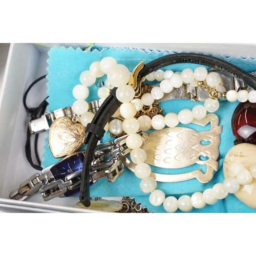 366 - A collection of mixed costume jewellery to include silver examples together with a selection of wris... 