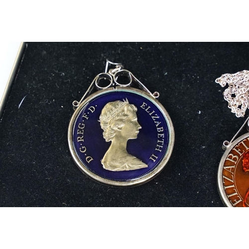 372 - A small Georg Jensen stainless steel bread basket within original box together with three commemorat... 