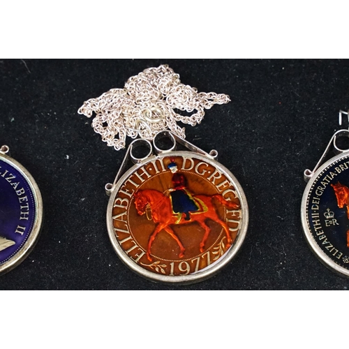 372 - A small Georg Jensen stainless steel bread basket within original box together with three commemorat... 