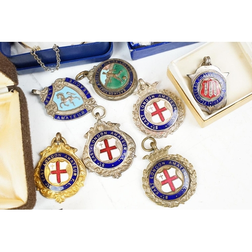 383 - A collection of mainly vintage costume jewellery together with a selection of sporting fob medals