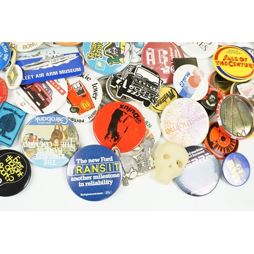 384 - A collection of vintage buttons badges and keyrings to include many advertising examples.