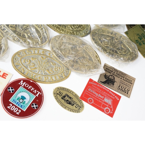 385 - A collection of mixed car badges together with a selection of brass steam rally badges.