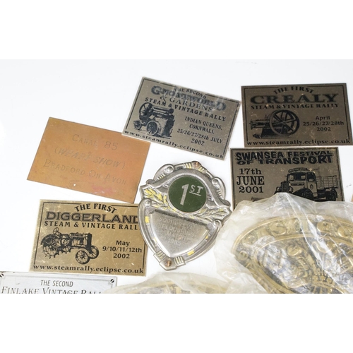 385 - A collection of mixed car badges together with a selection of brass steam rally badges.