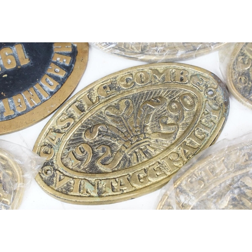 385 - A collection of mixed car badges together with a selection of brass steam rally badges.