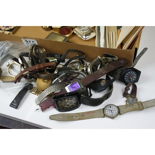 386 - A group of mixed collectables to include pill boxes, watches, fans and a selection of ships menus.