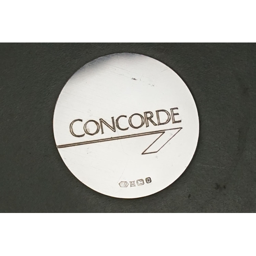 394 - A small group of mixed collectables to include a hallmarked sterling silver and enamel desk clock, a... 