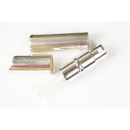 394 - A small group of mixed collectables to include a hallmarked sterling silver and enamel desk clock, a... 