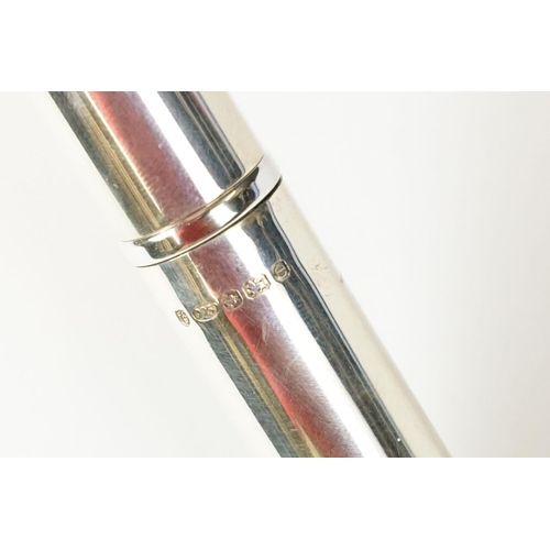 394 - A small group of mixed collectables to include a hallmarked sterling silver and enamel desk clock, a... 