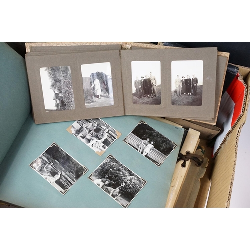 421 - Collection of mostly 1950s black and white photographs covering holidays, weddings and topographical... 