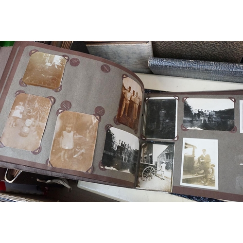 421 - Collection of mostly 1950s black and white photographs covering holidays, weddings and topographical... 