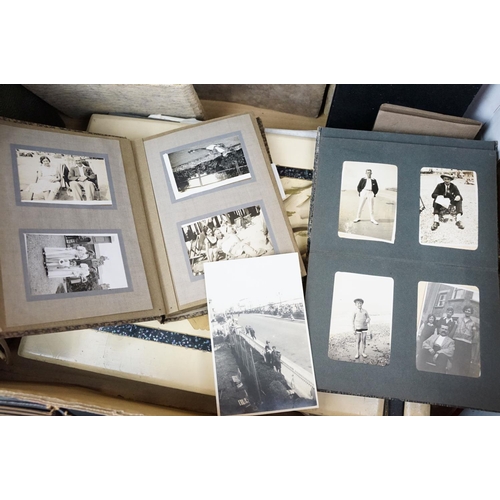 421 - Collection of mostly 1950s black and white photographs covering holidays, weddings and topographical... 