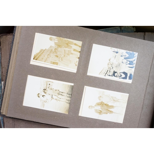 421 - Collection of mostly 1950s black and white photographs covering holidays, weddings and topographical... 