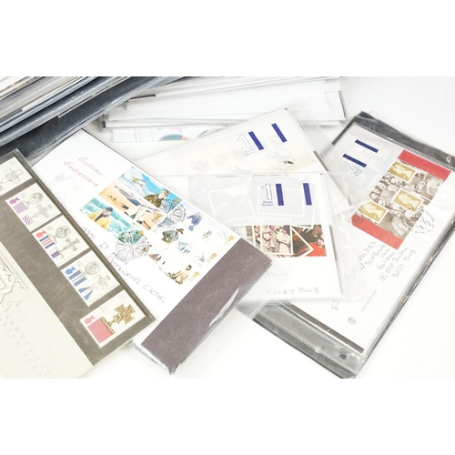 425 - Collection of Great British first day covers presented in wallets together with a selection of coins... 