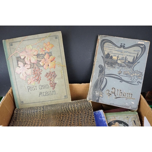 427 - Collection of early 20th Century postcards across multiple albums to include World War One interest ... 