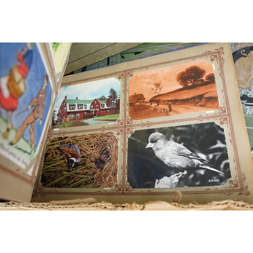 427 - Collection of early 20th Century postcards across multiple albums to include World War One interest ... 