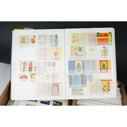 428 - Collection of assorted stamps to include a selection of first day covers, an album of matchbox label... 
