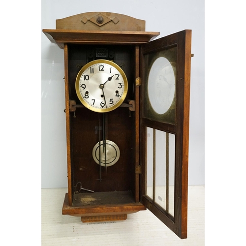 496 - Early 20th century mahogany wall clock, the silvered dial with Arabic numerals, approx 78cm tall