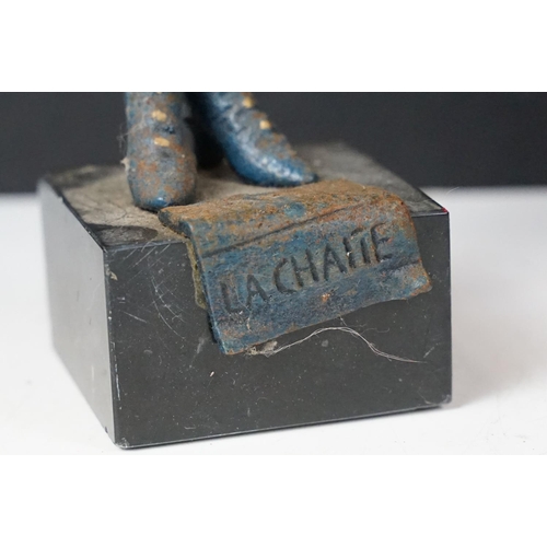 500 - Collection of eight cast iron figures to include a pair of Greyhound ornaments, Panther, Michelin Ma... 