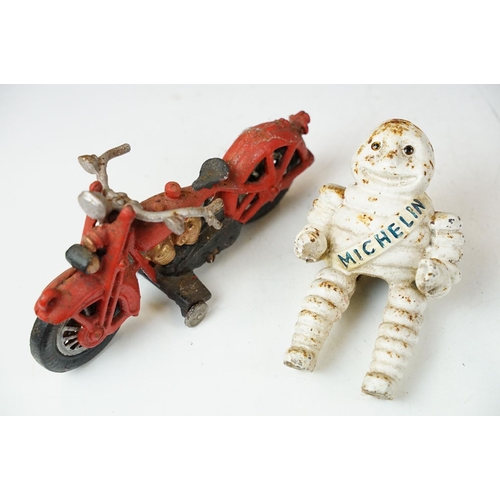 500 - Collection of eight cast iron figures to include a pair of Greyhound ornaments, Panther, Michelin Ma... 