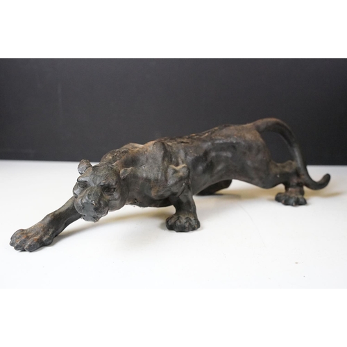 500 - Collection of eight cast iron figures to include a pair of Greyhound ornaments, Panther, Michelin Ma... 