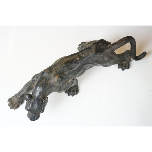 500 - Collection of eight cast iron figures to include a pair of Greyhound ornaments, Panther, Michelin Ma... 