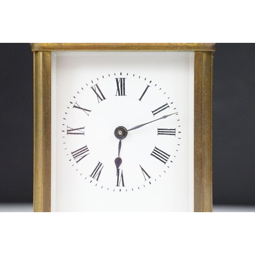 330 - Brass carriage timepiece, with case and key