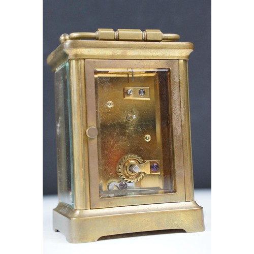 330 - Brass carriage timepiece, with case and key