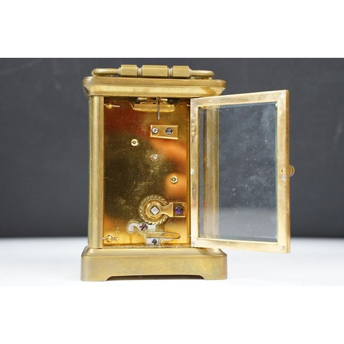 330 - Brass carriage timepiece, with case and key