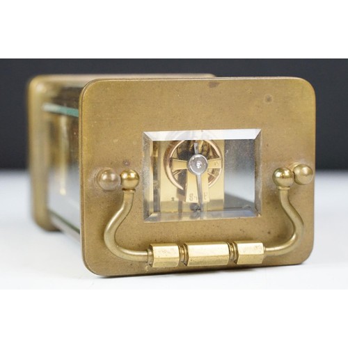 330 - Brass carriage timepiece, with case and key