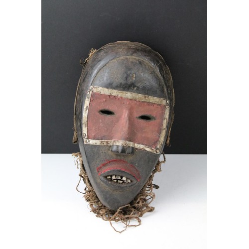 450 - Assorted 20th Century items to include a Christy's of London hat, small tribal mask, two brass and c... 