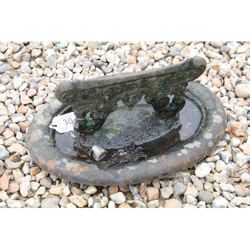 530 - Cast iron Victorian boot scraper of oval form, approx 32cm long