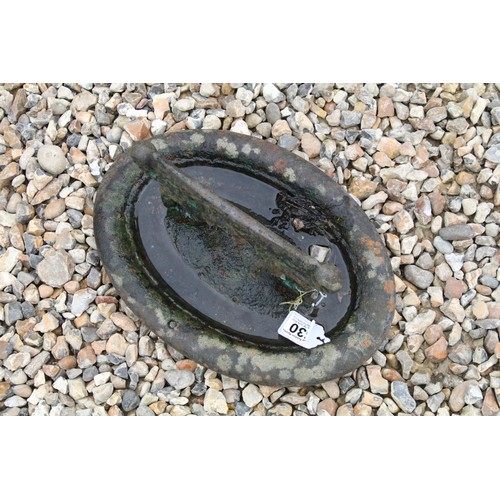 530 - Cast iron Victorian boot scraper of oval form, approx 32cm long