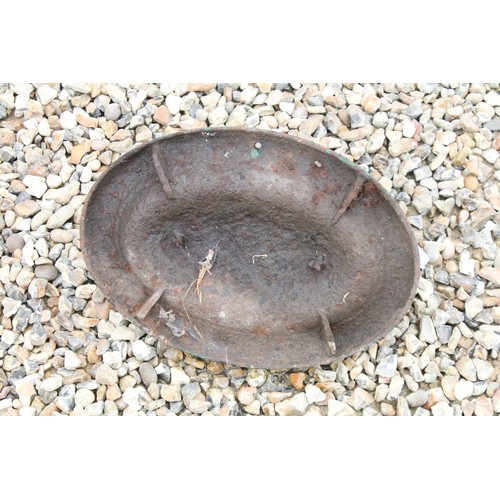 530 - Cast iron Victorian boot scraper of oval form, approx 32cm long