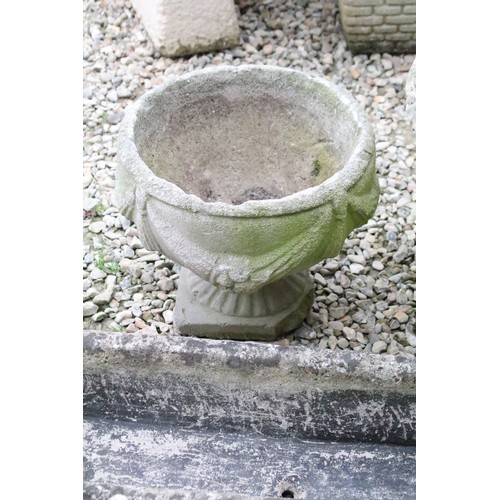 528 - Stone garden trough (approx 90cm long), together with two reconstituted stone footed planters