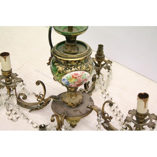 187 - Continental brass four branch electrolier, the green glass body decorated in gold, with oval porcela... 