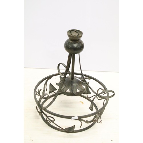 187 - Continental brass four branch electrolier, the green glass body decorated in gold, with oval porcela... 