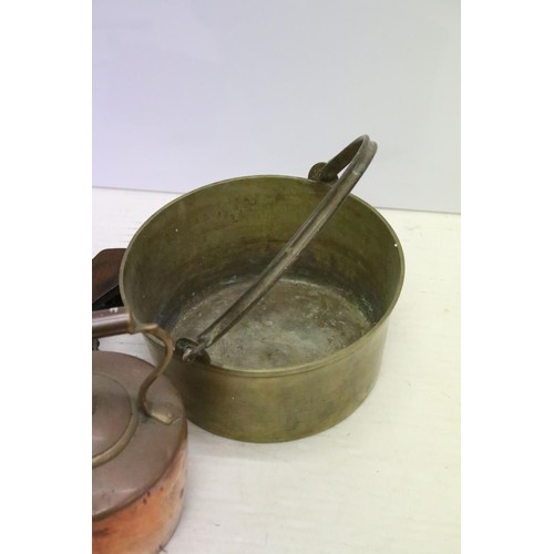 454 - Two Victorian wooden fire bellows together with a Victorian copper kettle, a pair of brass horse ham... 