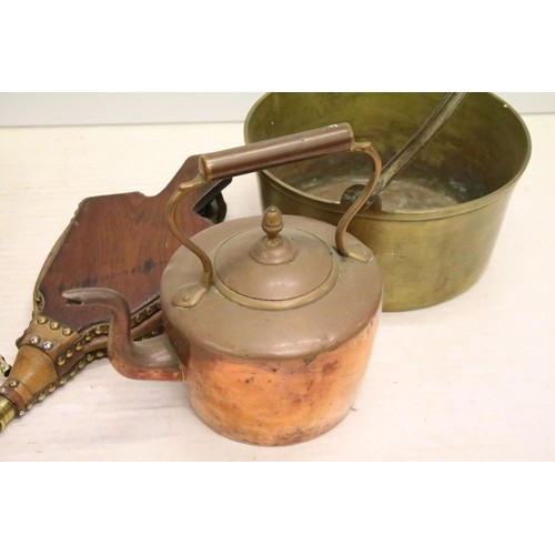 454 - Two Victorian wooden fire bellows together with a Victorian copper kettle, a pair of brass horse ham... 