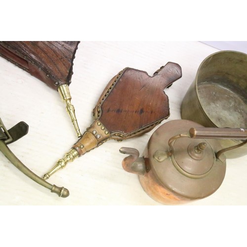 454 - Two Victorian wooden fire bellows together with a Victorian copper kettle, a pair of brass horse ham... 