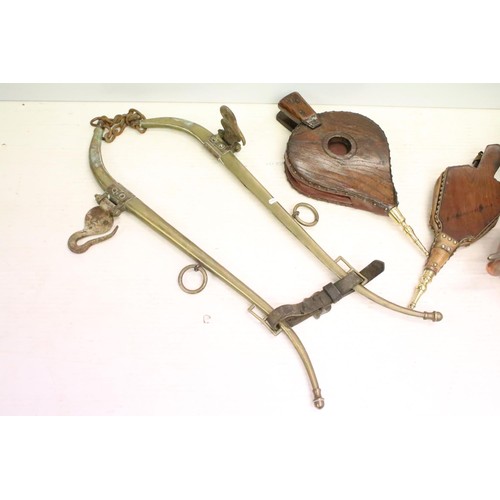454 - Two Victorian wooden fire bellows together with a Victorian copper kettle, a pair of brass horse ham... 