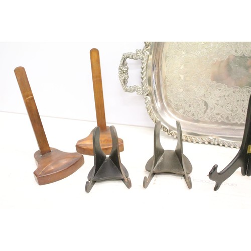 511 - Silver plated twin-handled tray, 61cm long, a silver plated circular tray, two silver plated pepper ... 