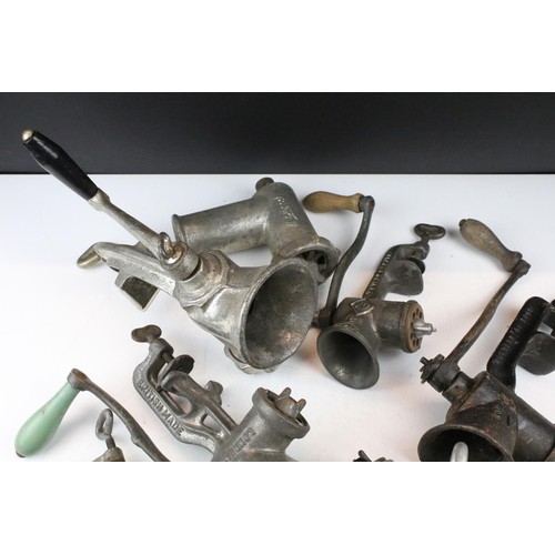 457 - Collection of vintage kitchenalia meat grinders including Spong and Harper.