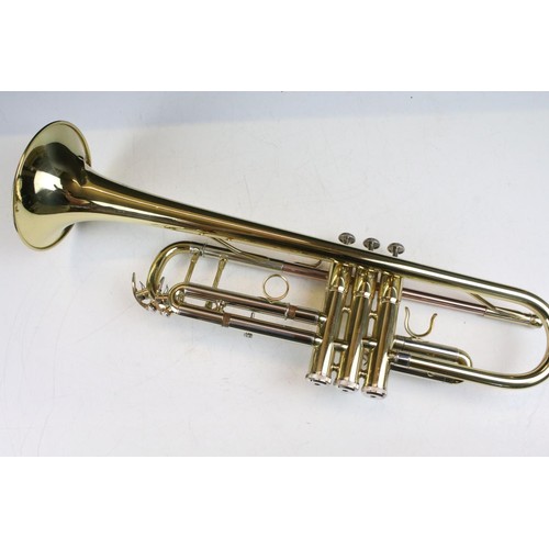 458 - Conservatoire trumpet complete with mouthpiece and fitted carry case.