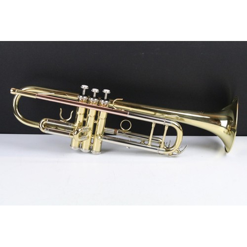 458 - Conservatoire trumpet complete with mouthpiece and fitted carry case.